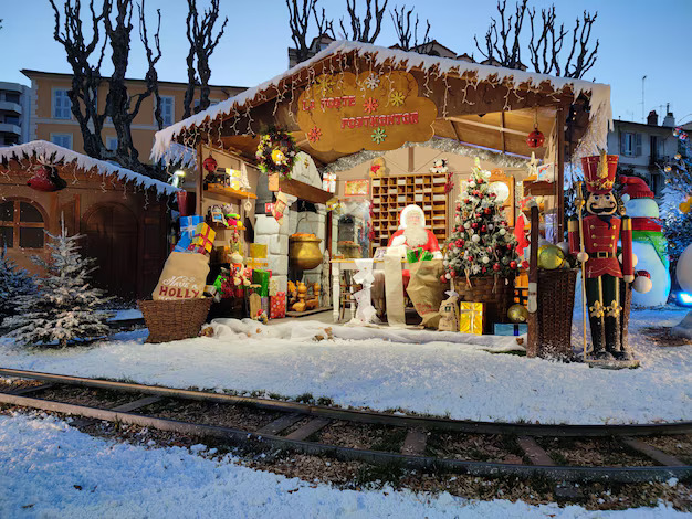 Black Forest Germany: "Festive Christmas village display with Santa Claus in a decorated wooden hut surrounded by gifts, a Christmas tree, and snow-covered ground at a winter market"