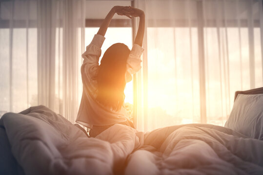 Morning Habits Person stretching after waking up
